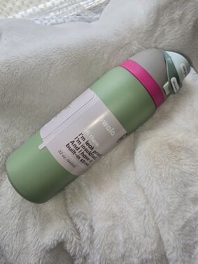 Owala Insulated Green Travel Bottle with Pink Accent and Mint Handle